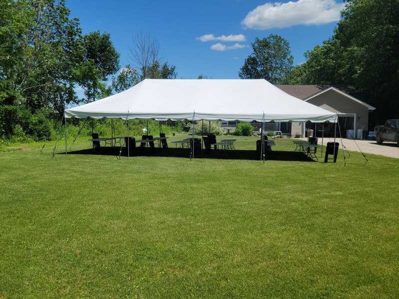 Tent in front of house